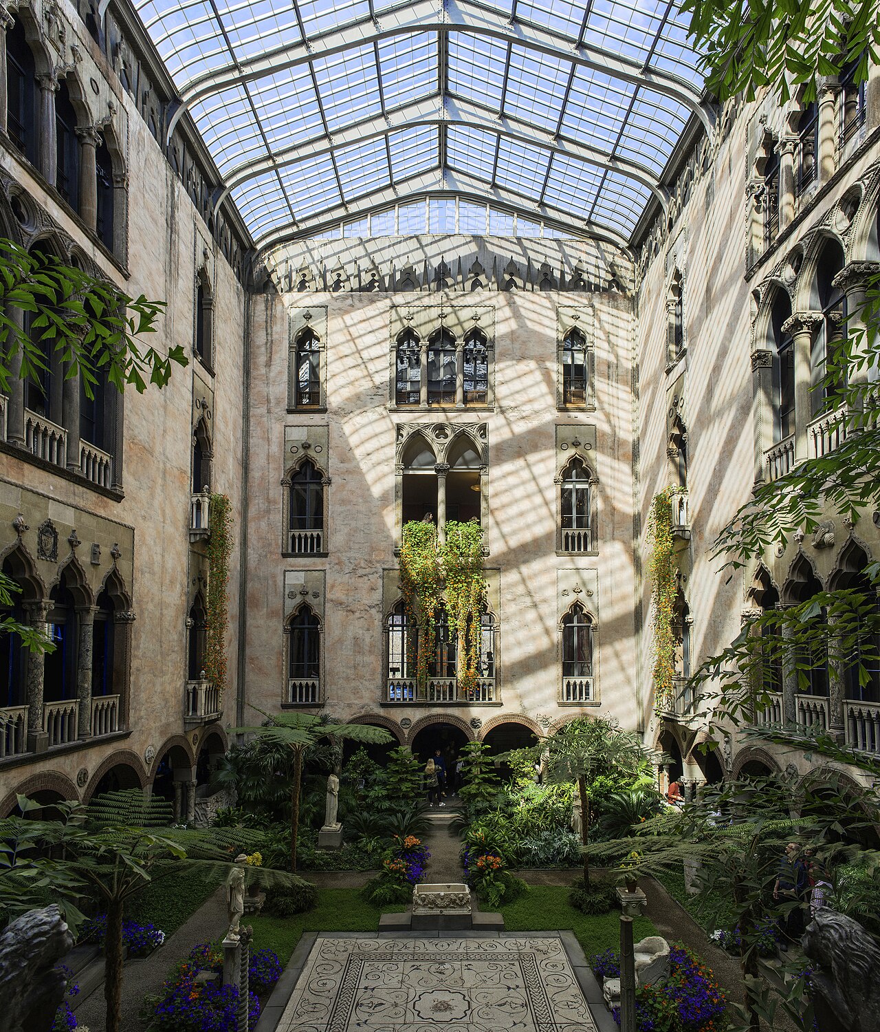 The glass-roofed courtyard garden of the Isabella Stewart Gardner Museum, Boston